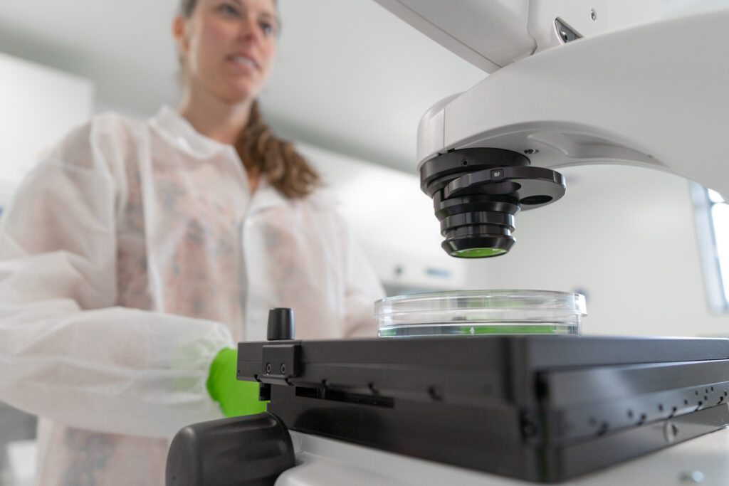 Handling cell cultures in the lab.